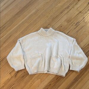 - Babaa cream sweater